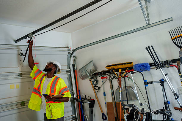Professional Garage Door Panel Replacement technician working in Ottawa County County, OK